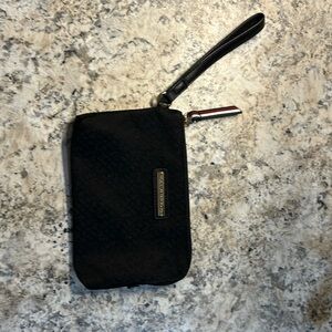 NWOT. Tommy Hilfiger black zip top wristlet.